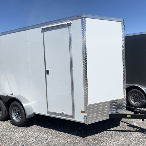 7X14 WELLS CARGO ENCLOSED TANDEM 3500/7K W/ RAMP DOOR AND ESCAPE DOOR