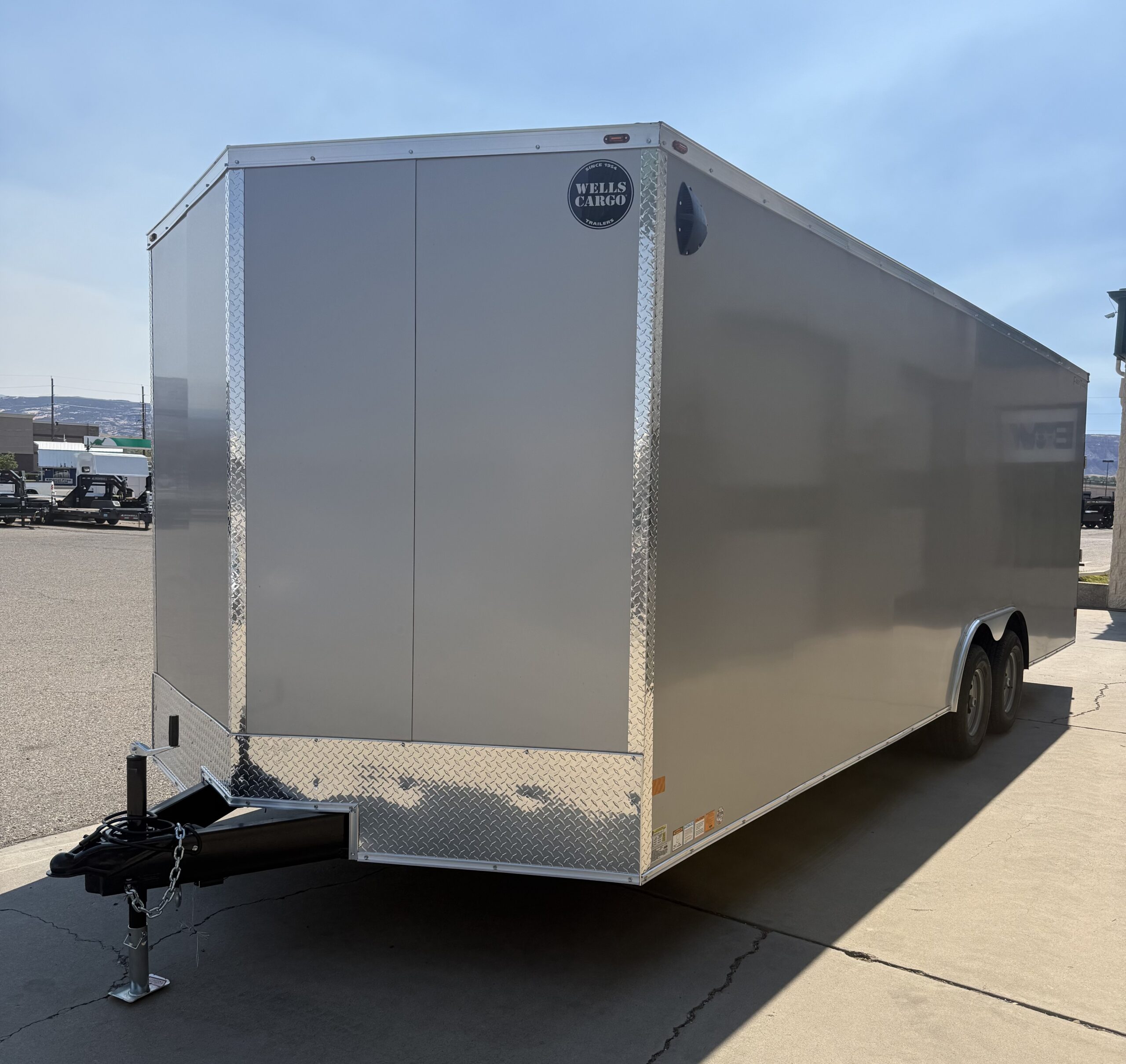 2026 Wells Cargo 8-1/2'x24' 10,000lb Rated Enclosed Car Hauler Trailer.
