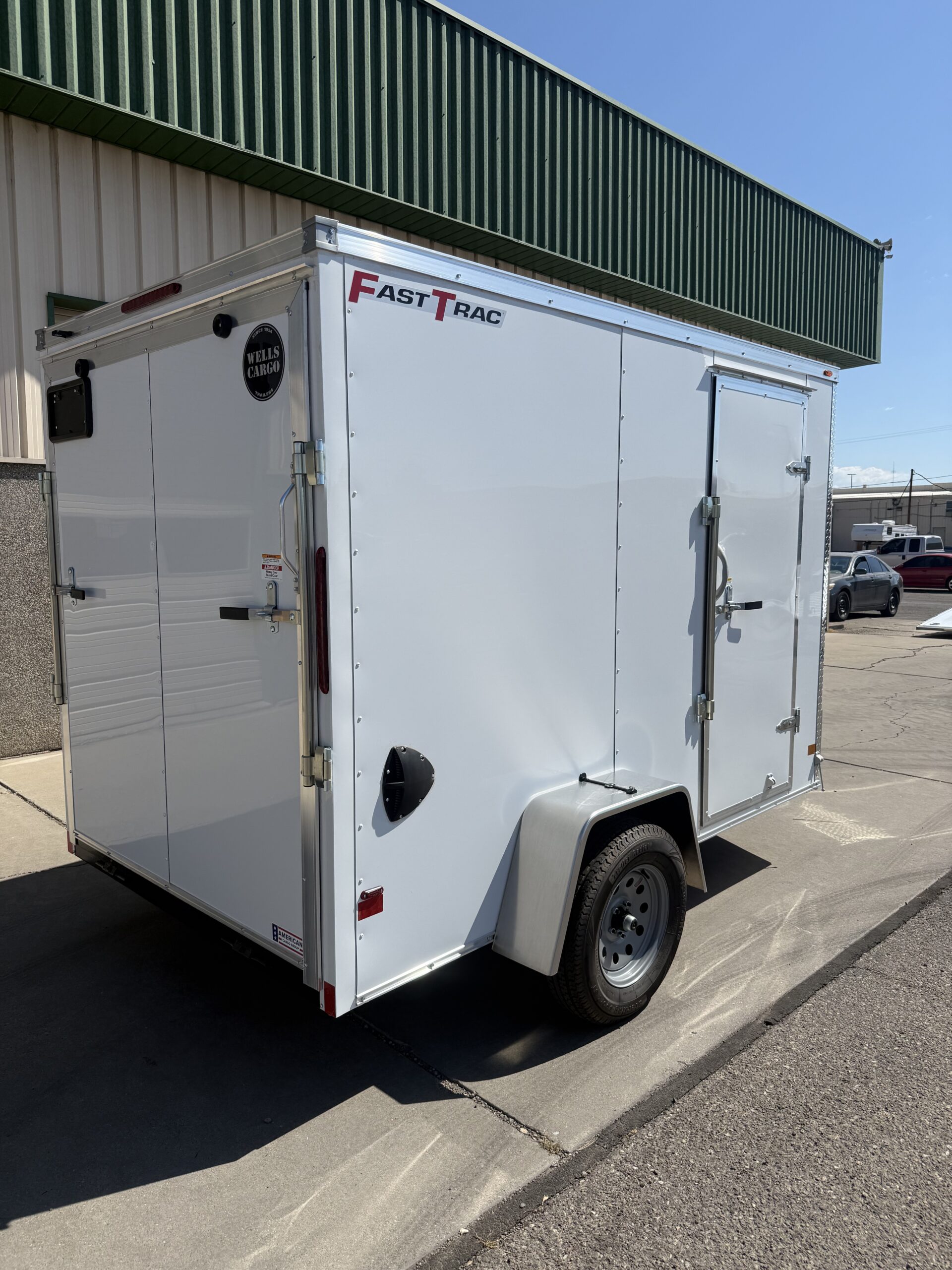 2027 Wells Cargo 6'x10' Ramp Door Enclosed Trailer - Image 4