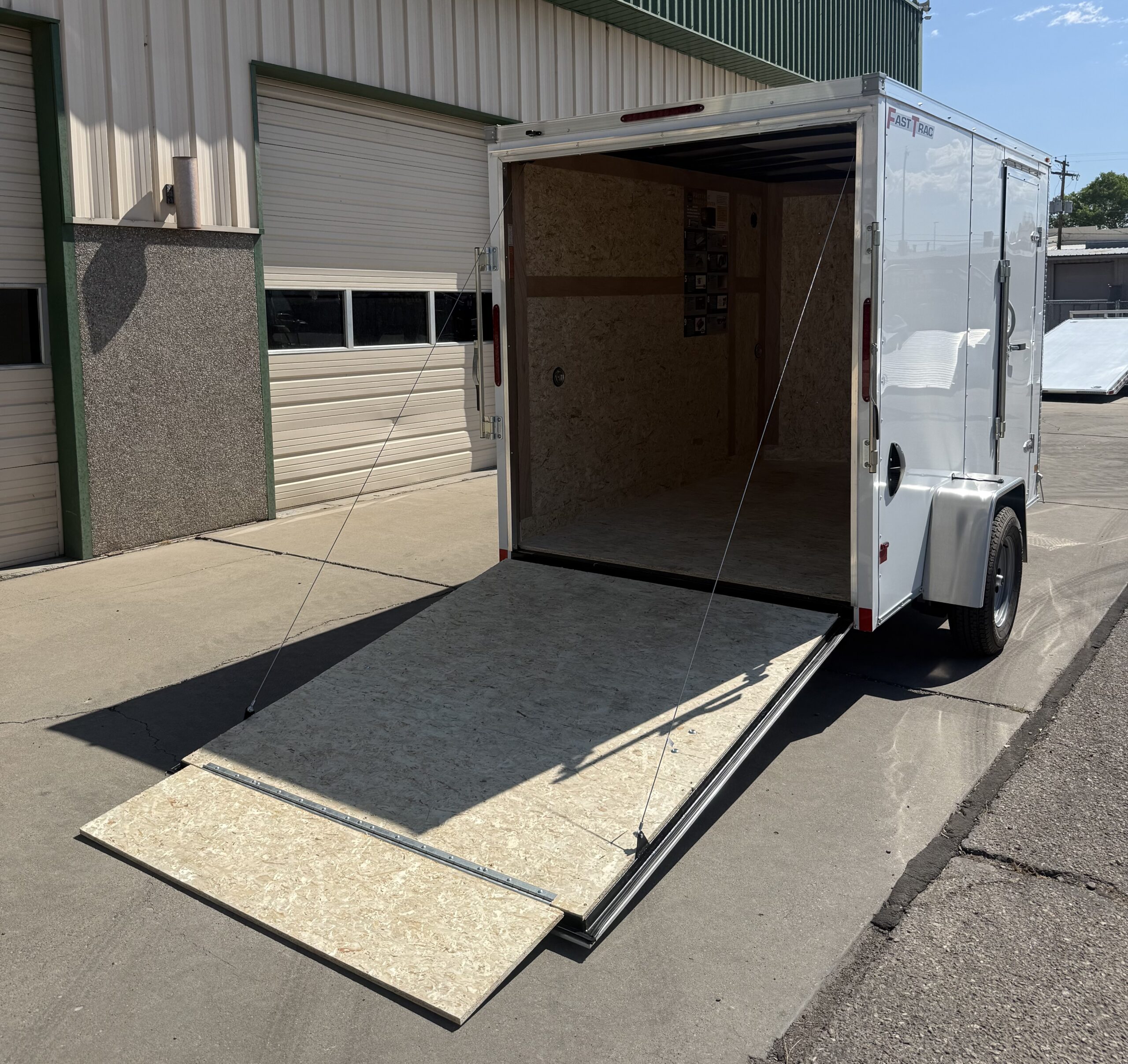 2027 Wells Cargo 6'x10' Ramp Door Enclosed Trailer - Image 5