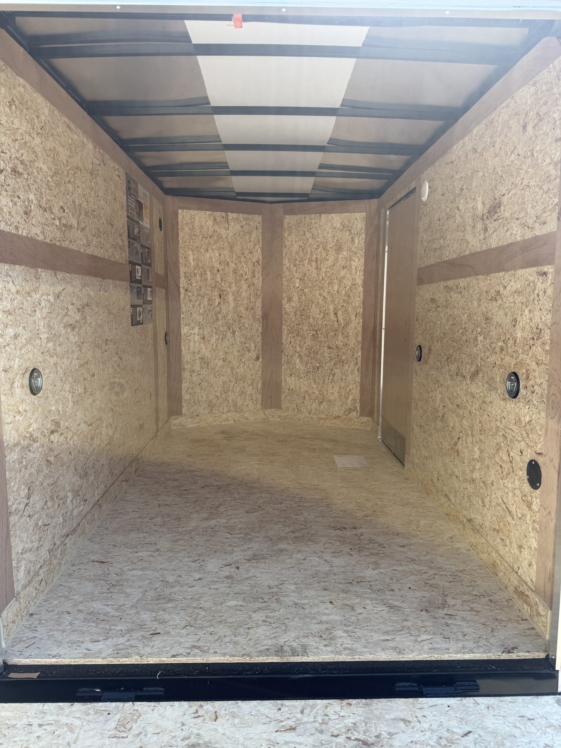 2027 Wells Cargo 6'x10' Ramp Door Enclosed Trailer - Image 6